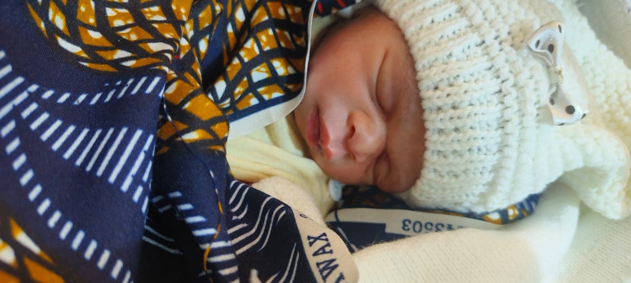 Sleeping newborn at CORE Fertility Clinic